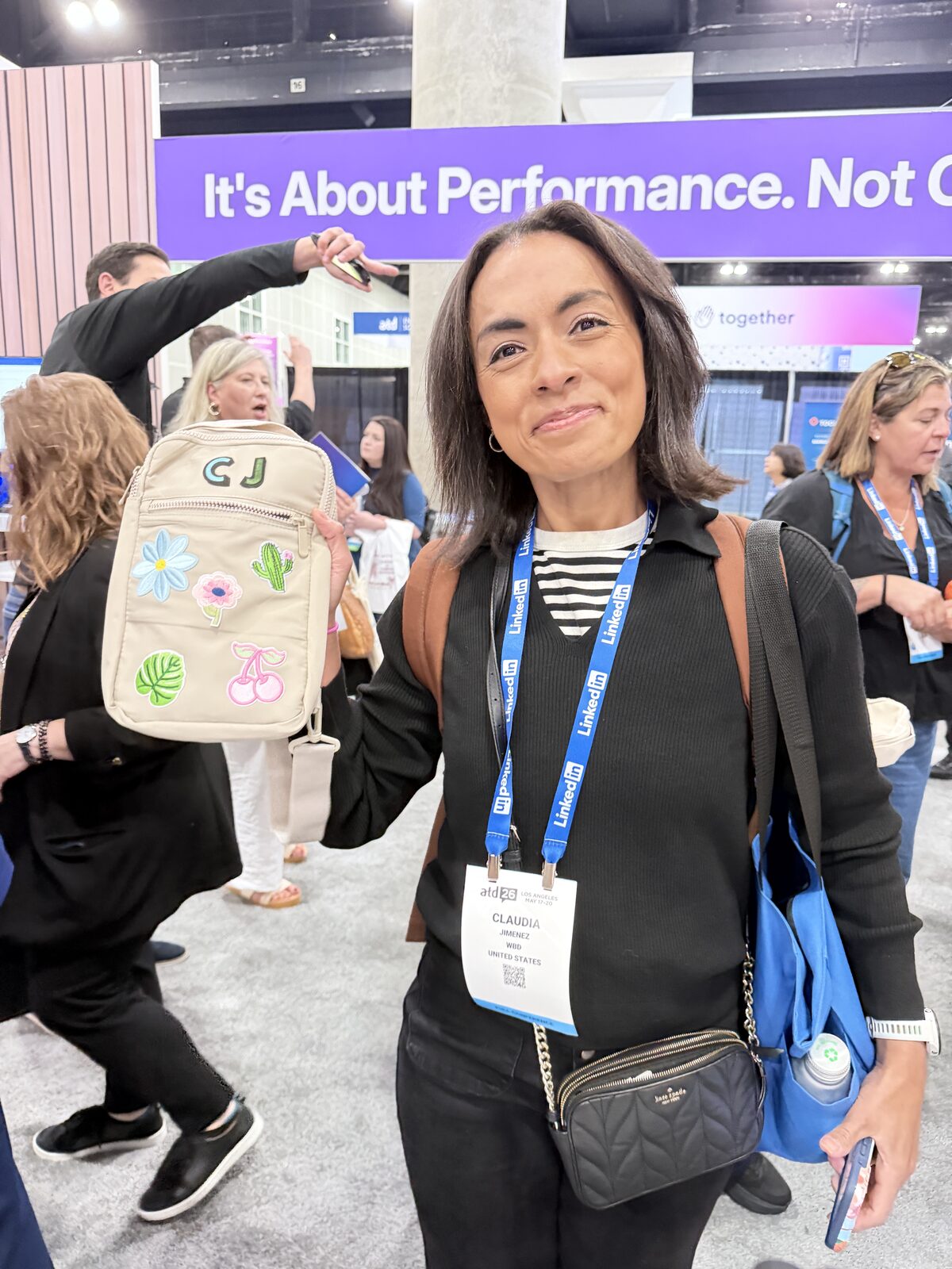 Guest personalizing a bag with a patch at the station
